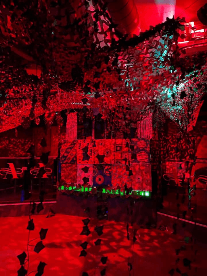 Red-lit dancefloor and DJ booth at Altoria Leamington
