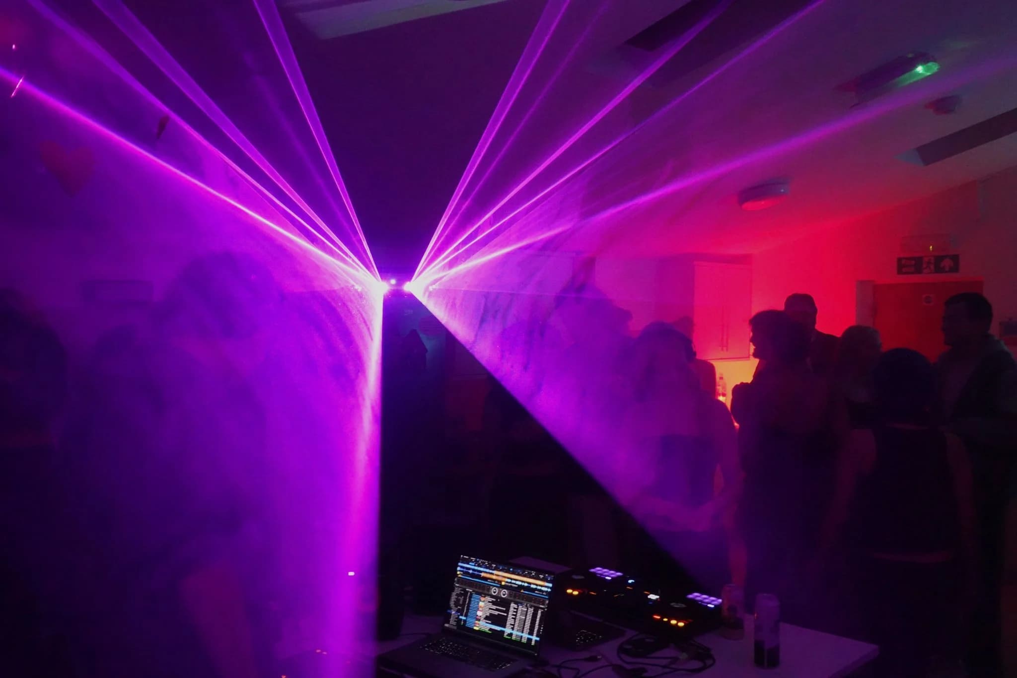 Purple lasers crossing the Requiem dancefloor