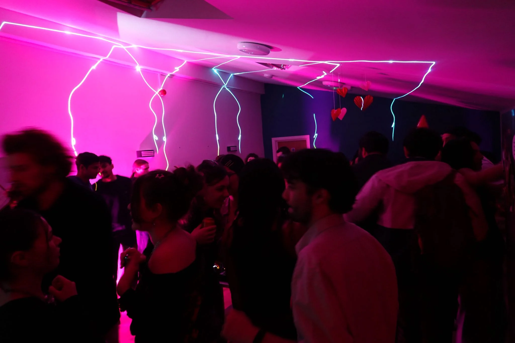 The crowded Requiem dancefloor under pink light